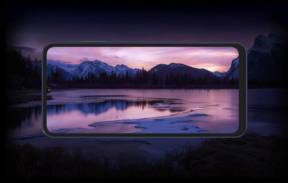 Smartphone screen displaying a mountain landscape with a purple sky