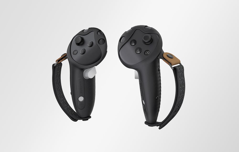 Two controllers with covers on a white background