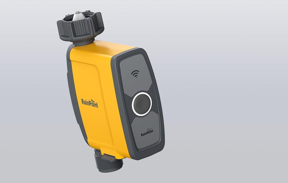 The RainPoint irrigation controller in yellow.