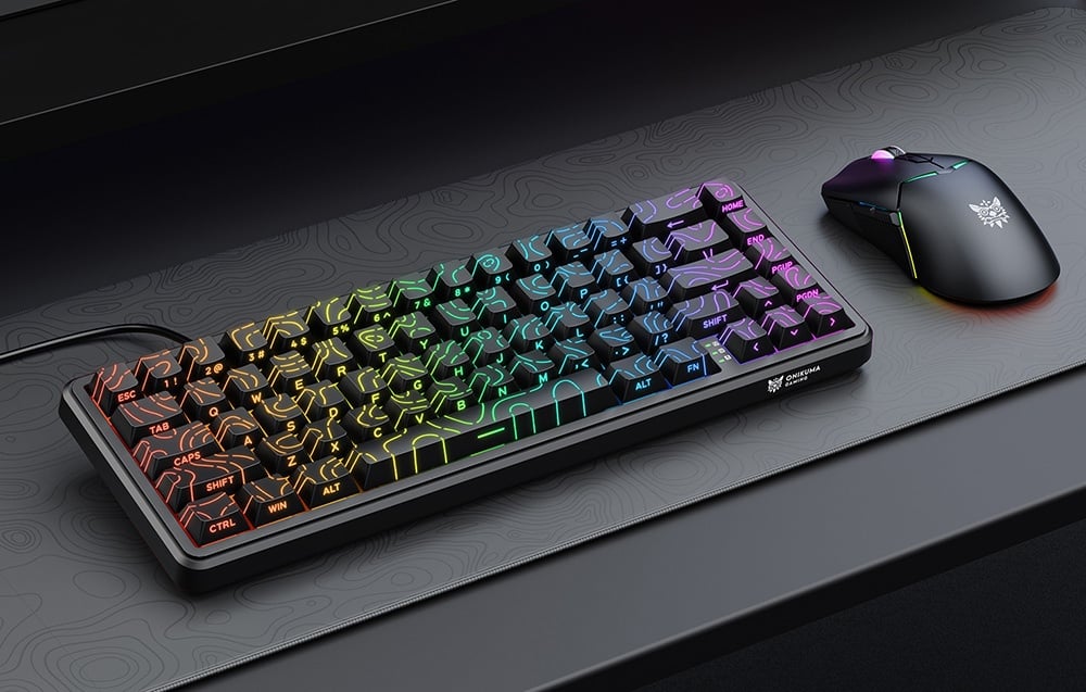 RGB backlit keyboard and gaming mouse on a pad on a dark desk