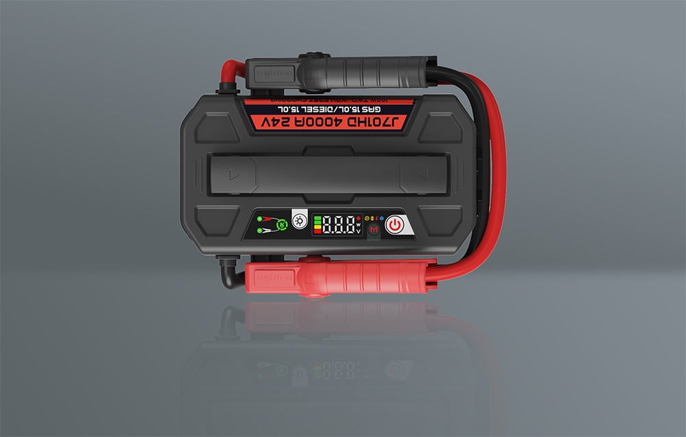 Top view of the jump starter with a digital display, buttons, and black and red clamps.
