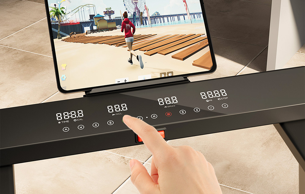 Finger touching the LED control panel on the treadmill with a tablet showing a running figure