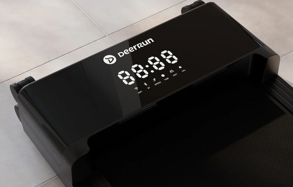 Close-up of the black LED display of the DeerRun treadmill showing digital time and function icons