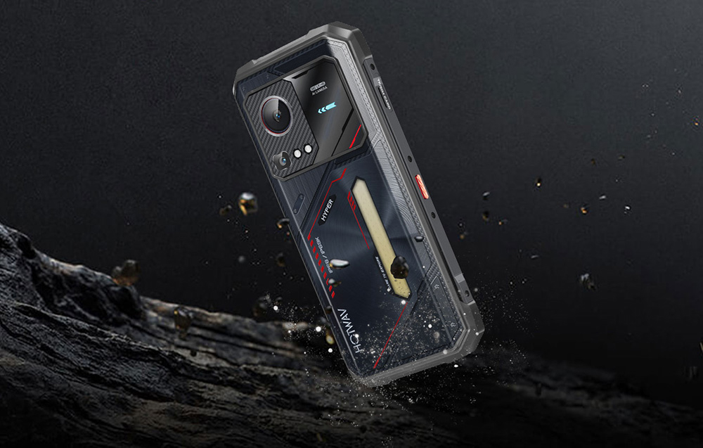 A rugged HOTWAV smartphone floating above rocky ground among splintering stones, suggesting impact resistance.