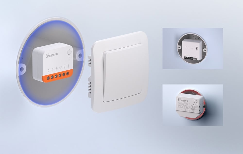 A switch in a junction box next to a light switch; to the right, two other, larger switches in junction boxes