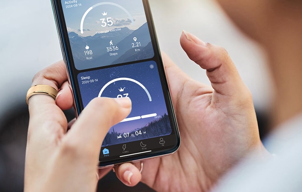 A smartphone held in the hand with an app turned on.