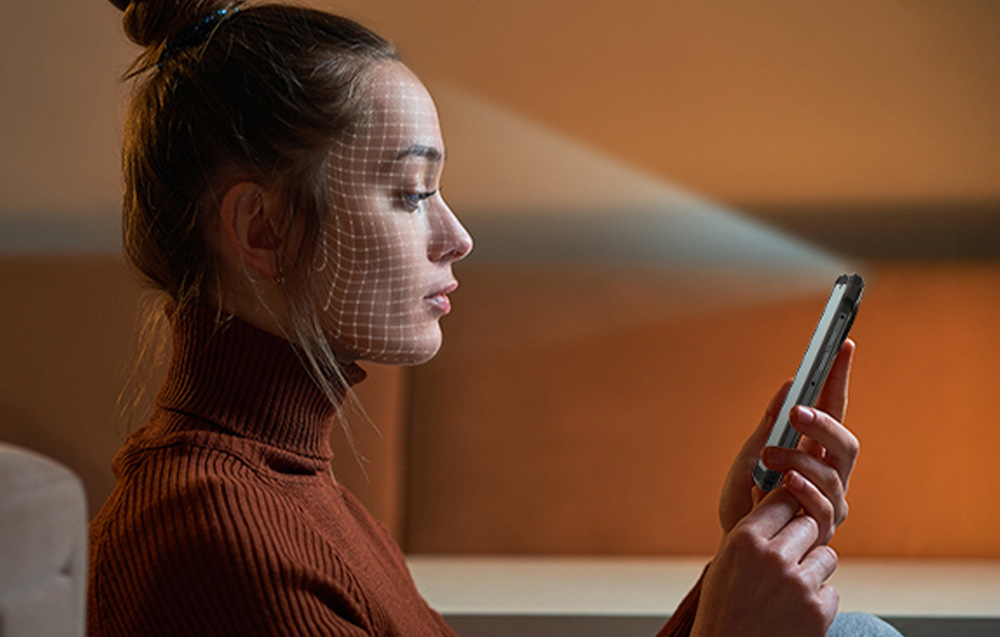 Woman scanning her face with a Hotwav smartphone