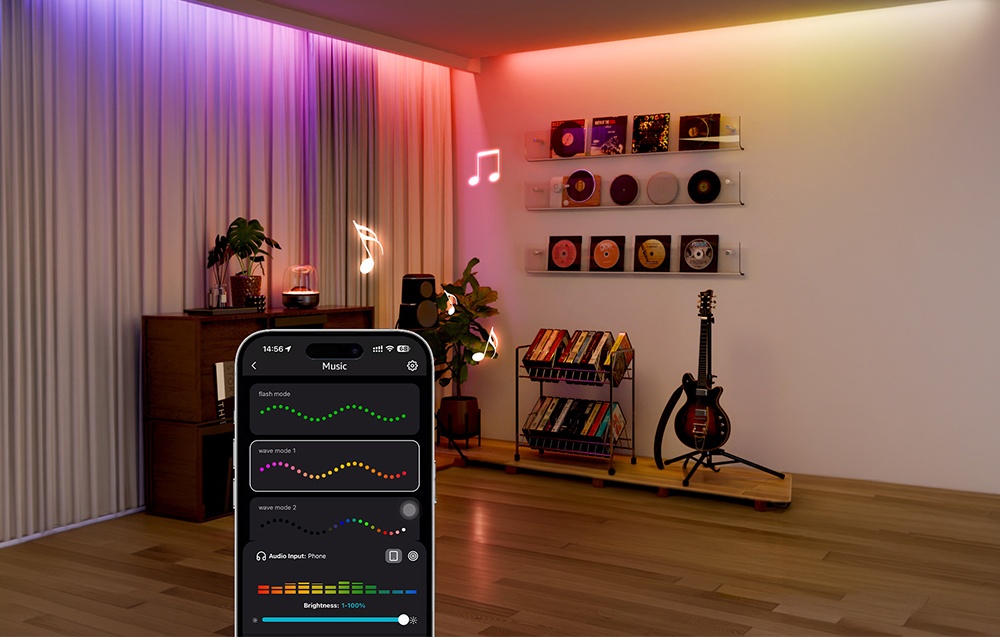 Room with a guitar and records illuminated by colored LED strips; in the foreground, a smartphone with the lighting control app open