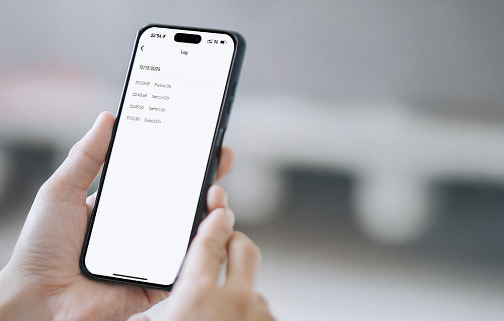 Close-up of a smartphone with an app showing the history of the smart switch being turned on and off.
