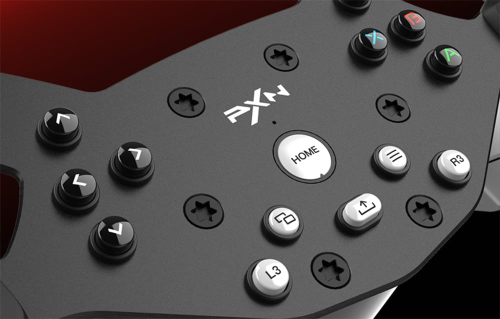 Close-up of the black racing steering wheel plate with numerous labeled buttons and the central PXN logo