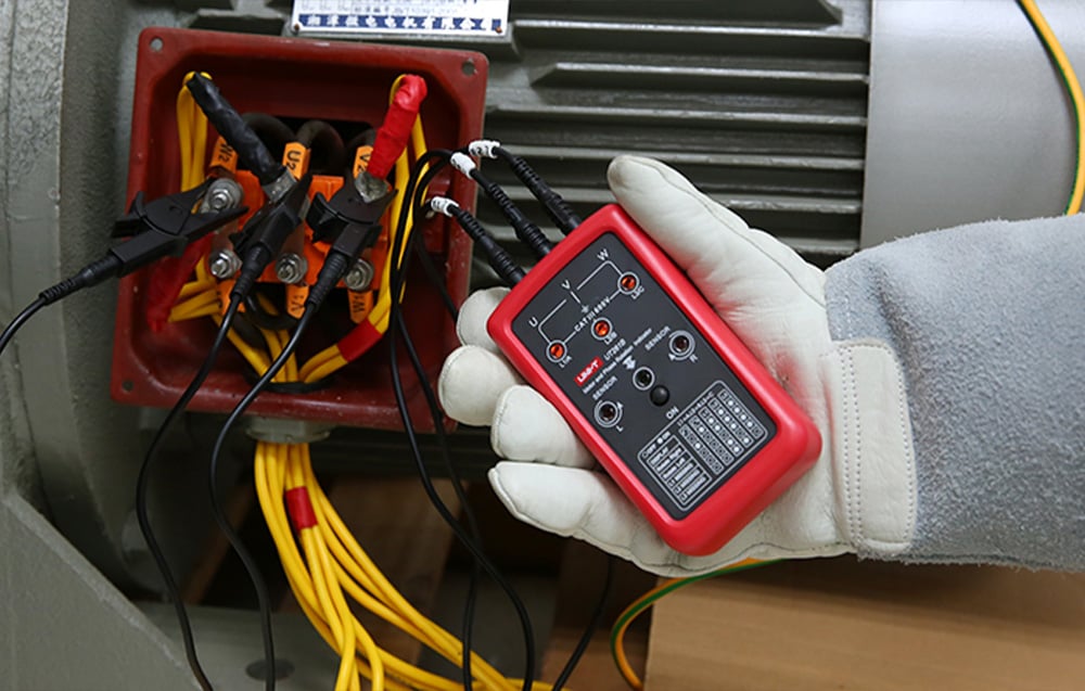 Phase sequence tester used to check three-phase connections on an electric motor.