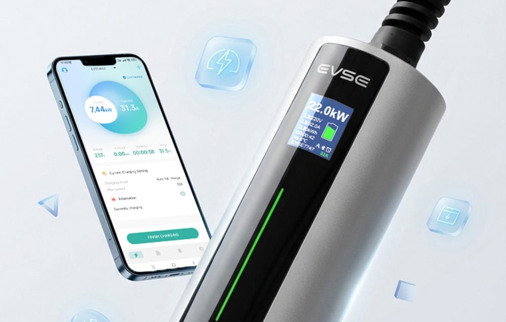 A smartphone with the app open and an EV car charger