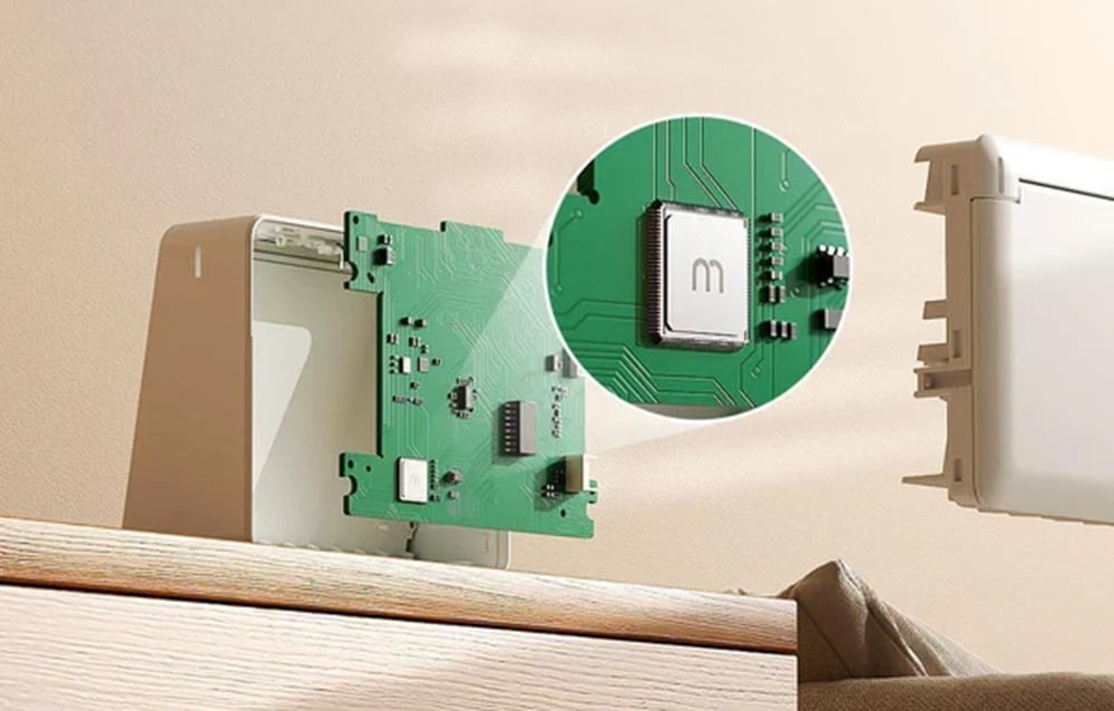 Interior view of Meross clock with exposed circuit board and close-up of microchip