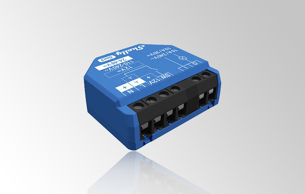 Angled view of a blue Shelly Gen3 module on a gray background, showing five black inputs and white markings