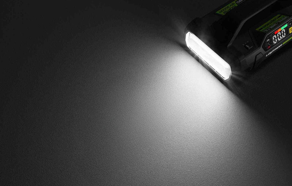 A powerful beam of white light emanating from the front of the device in the dark.