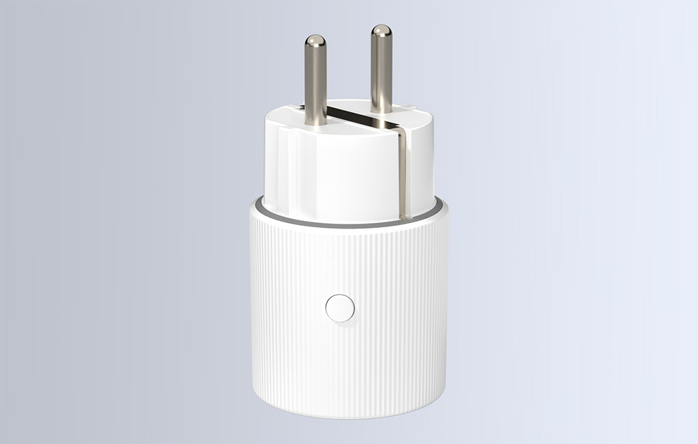 A smart plug with a visible button on a light background.