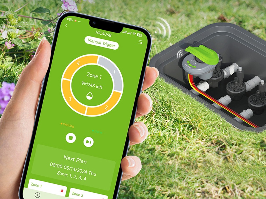 Smartphone app showing the active sprinkler zone next to the RainPoint controller mounted in the box.