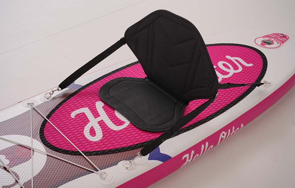 Black seat mounted on a pink board