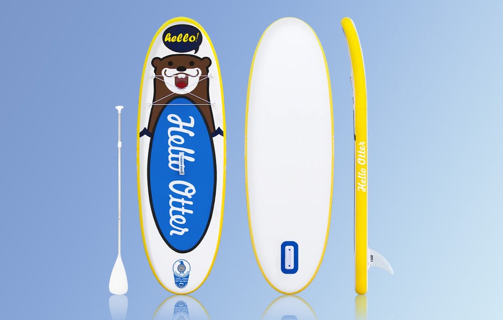 Colorful surfboard for children from several perspectives, next to a paddle