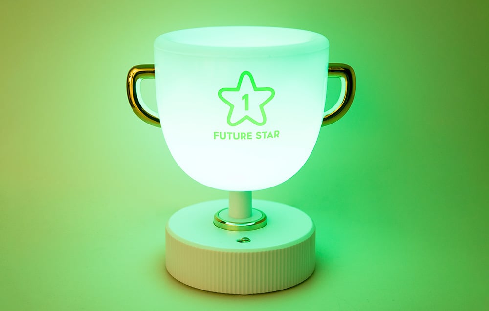 The green light emitted by the SuperFire W-006 Champion Light bedside lamp.