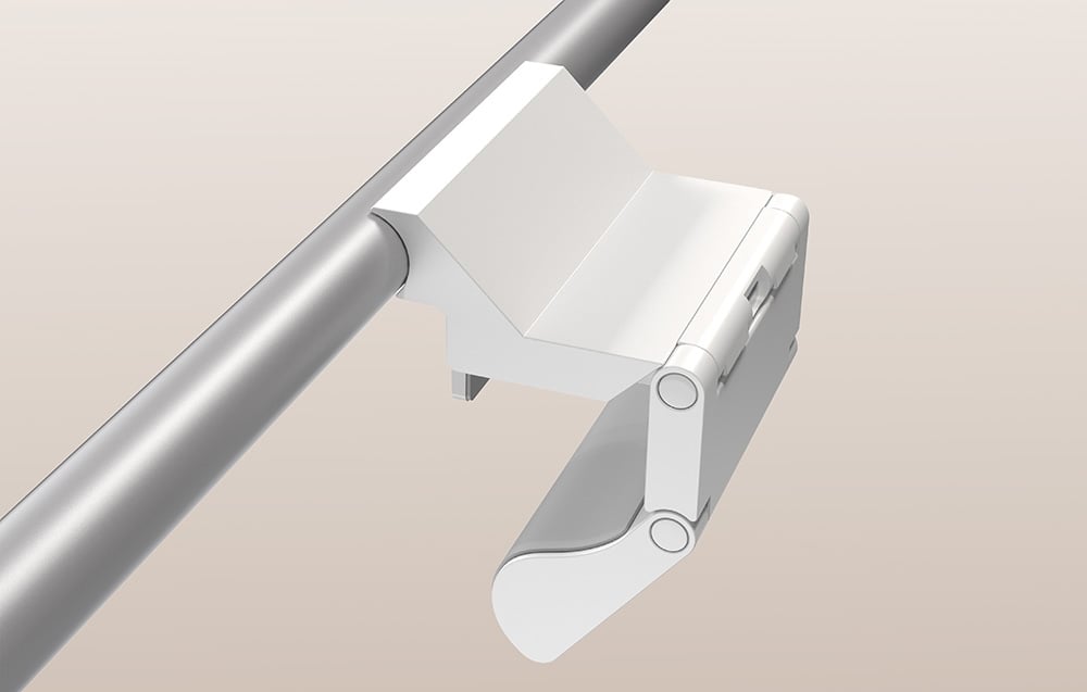 Close-up of the white Yeelight lamp mount attached to the monitor’s silver tube, showing its construction