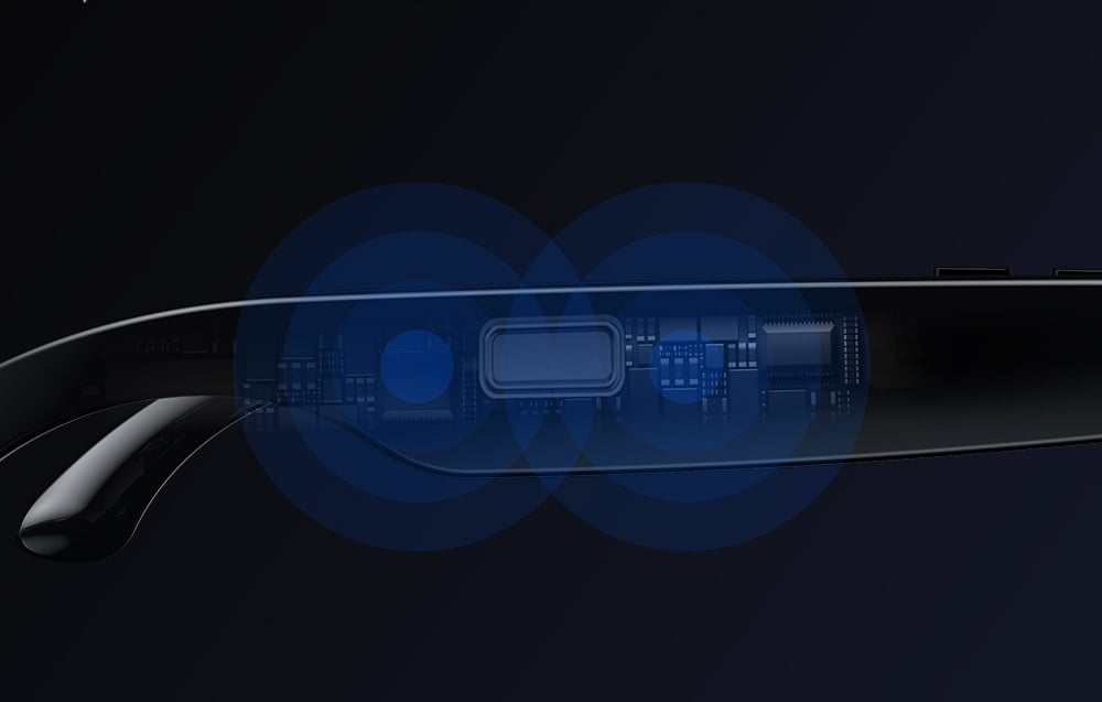 Close-up of AI glasses components on a black background