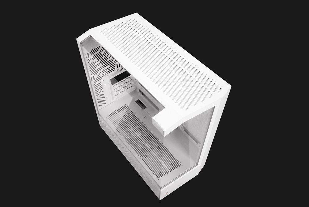 Blank white computer case with perforated panels and glass side panel on black background