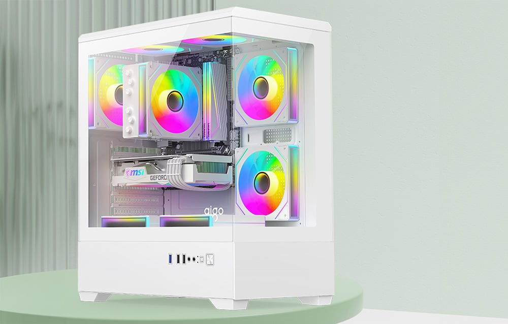 White computer case with RGB fans in a green setting