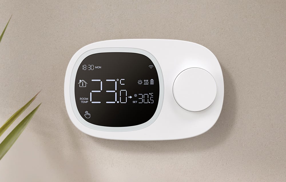 Smart thermostat on the bright wall