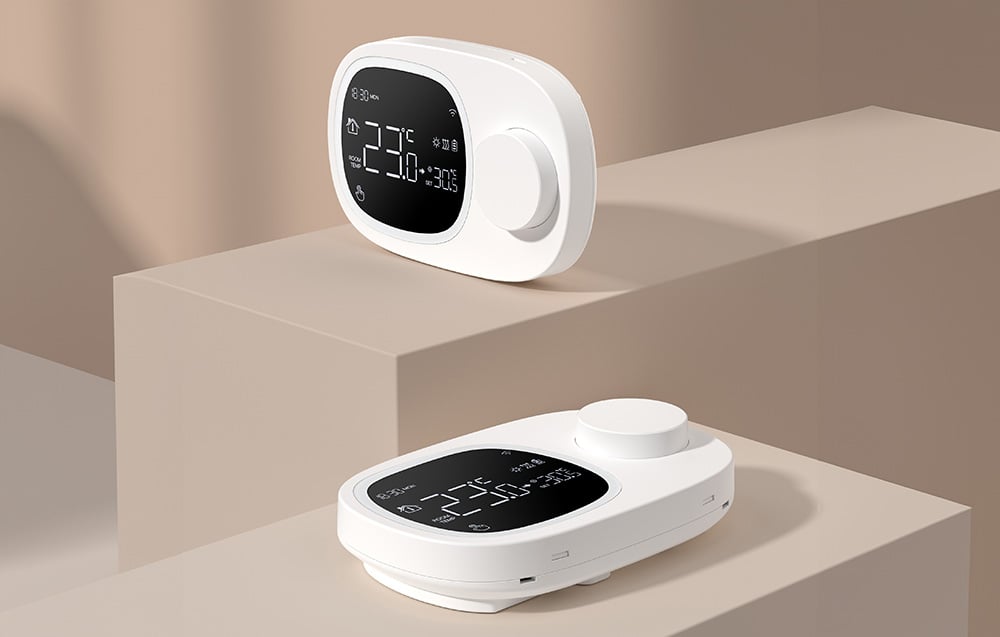 2 smart thermostats on brown platforms