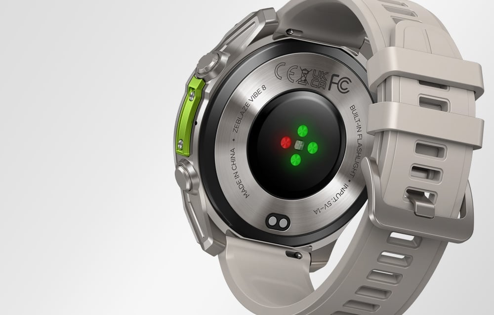 Rear side view of smartwatch with visible heart rate sensor with green LEDs