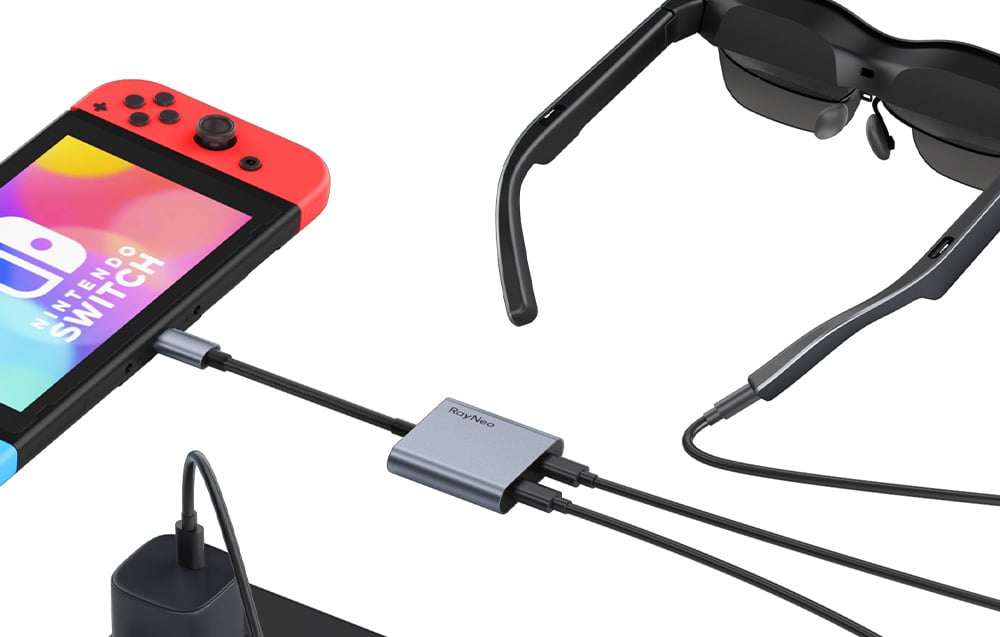 Nintendo Switch console connected to RayNeo smart glasses using the USB-C adapter and power cable.