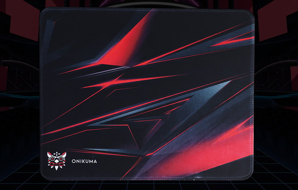 Black-and-red Onikuma mouse pad on a dark background