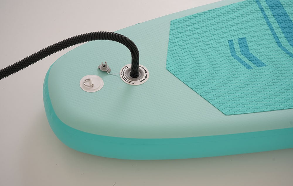 Close-up of the valve of an inflatable surfboard