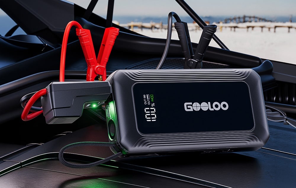 Starter connected to a car battery with visible terminals
