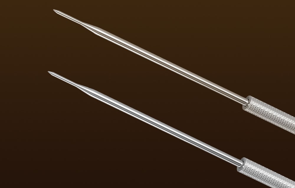 Close-up of two SONOFF MPS01 probes on a dark brown background.