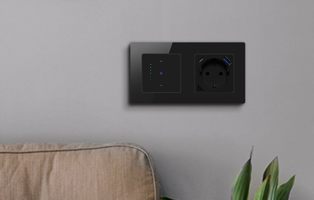 Black glass frame with dimmer and USB socket mounted on the wall.