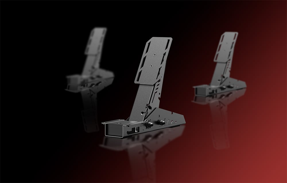PXN clutch pedal in graphite color shown from the side with fuzzy copies in the background on a gradient background