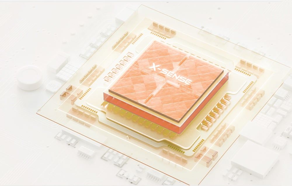 Close-up of a modern microprocessor with the X-Sense logo mounted on the electronic circuit board