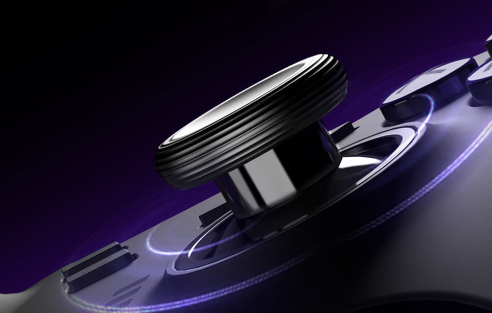 Extreme close-up of the controller’s analog stick with purple and blue light rings