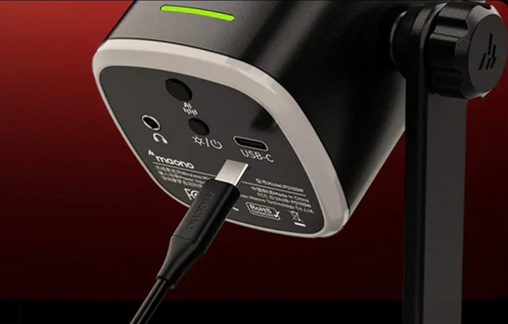 Close-up of the bottom panel of the Maono microphone with a connected USB-C cable and visible ports