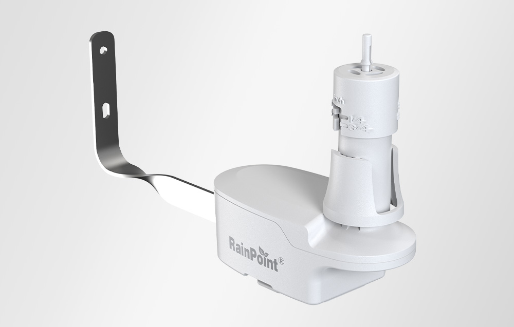 White RainPoint rain sensor with visible inch scale, side view