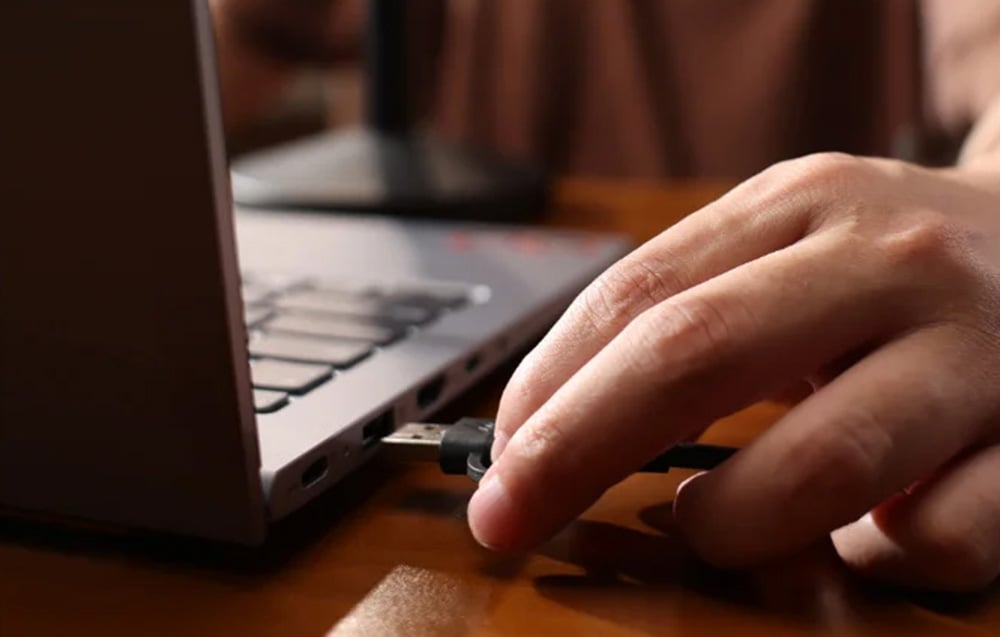USB cable connected to laptop