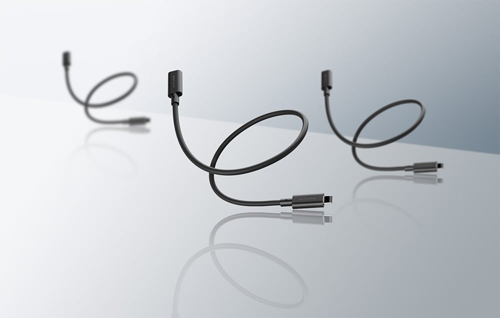 Three identical black VITURE-branded USB-C cables float above a mirrored, reflective surface