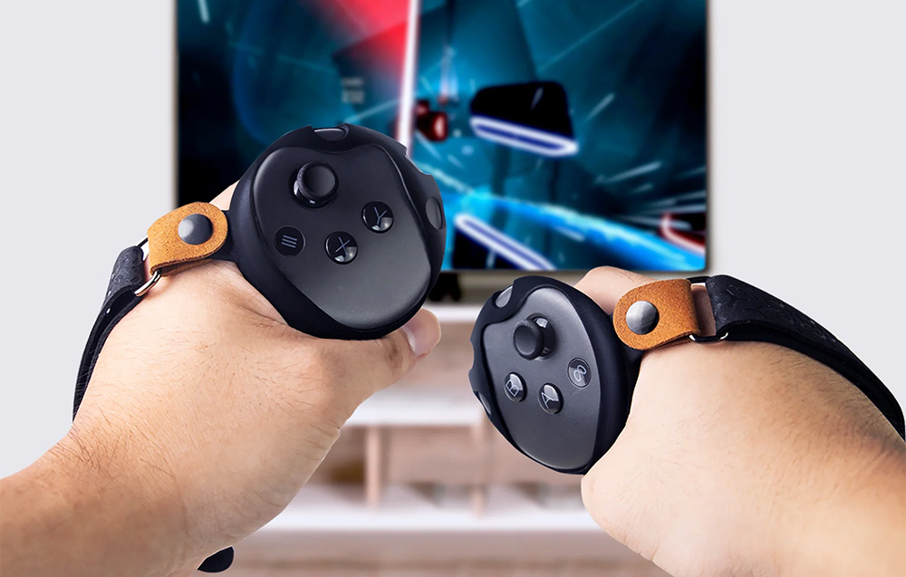 Person holding controllers with covers against a TV background with futuristic graphics