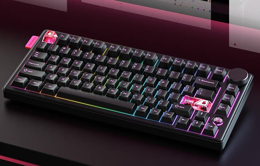 Onikuma black keyboard with backlight on black desk