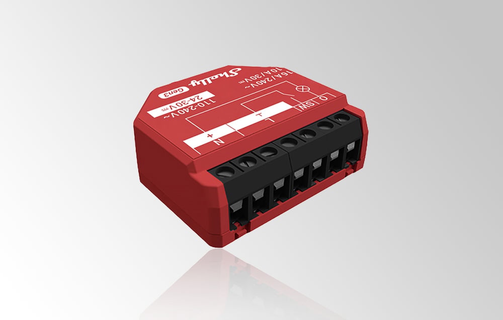 Angled view of a red Shelly 1PM Gen3 module against a gray background, showing six black connectors and white markings