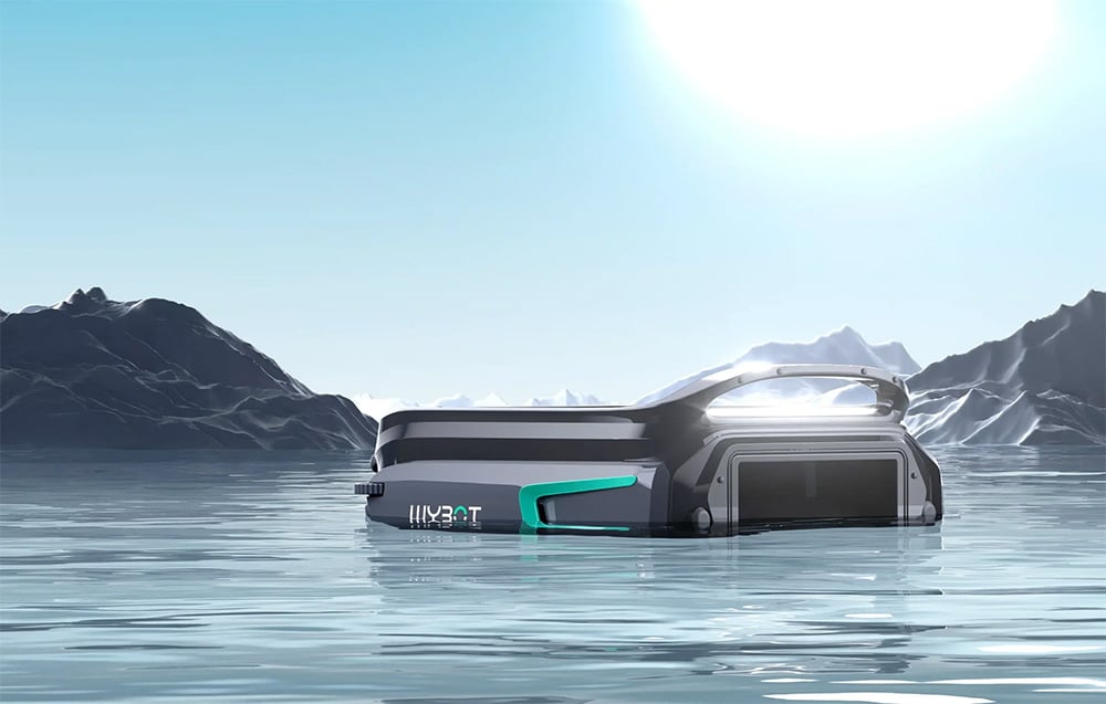 Wybot F1 robot floating on water surrounded by mountain scenery