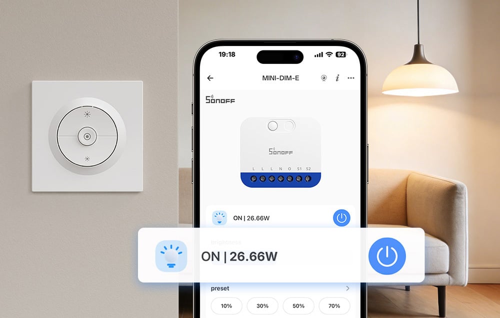 Light switch on the wall in the living room with a sofa and soft lighting in the foreground, smartphone with the Sonoff app open