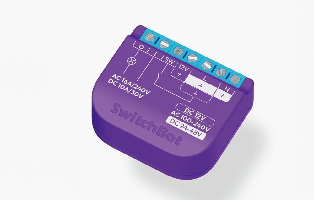 SwitchBot smart switch in purple case with blue screw terminals and wiring diagram